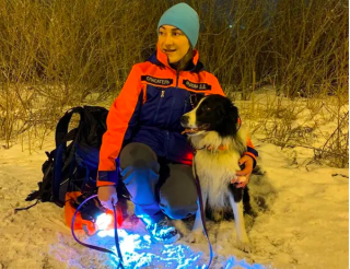 Dog Vzhik helped volunteers save a man in a winter forest